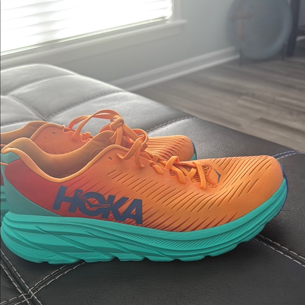 Hoka Vibrant Orange and Teal Sneakers